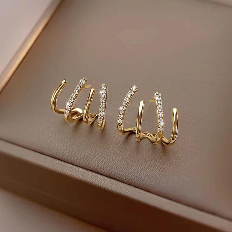 goldfinn aura four claw gold finish earring 2 goldfinn aura four claw gold finish earring 2